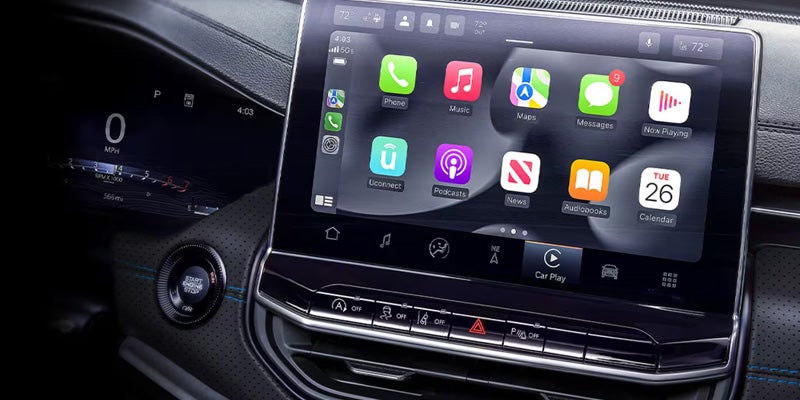 Jeep Compass touchscreen infotainment display showing Apple CarPlay connectivity